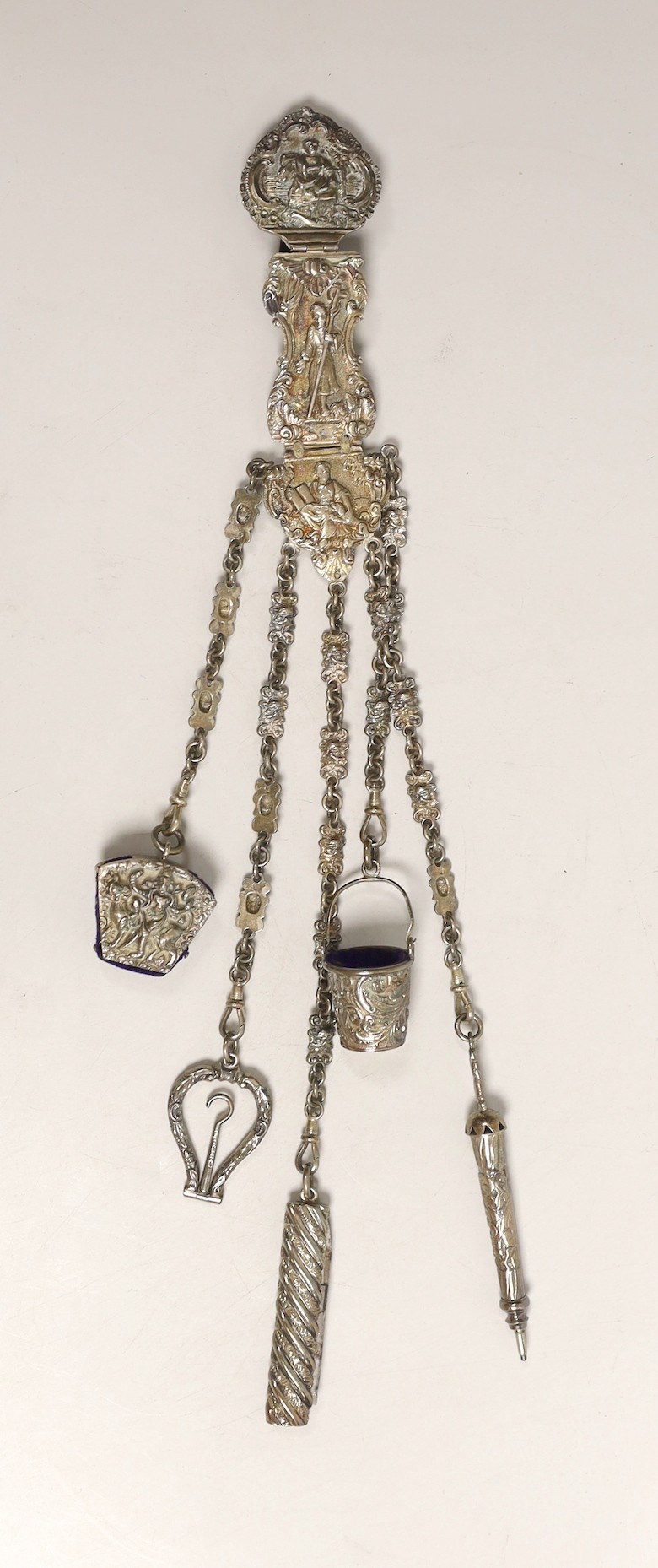 A Victorian white metal chatelaine with five accessories, import maker's mark for B.H. Joseph & Co, 32.7cm.
